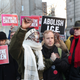 Therese Patricia Okoumou arrives for her sentencing at federal court in New York Mar. 19, 2019.